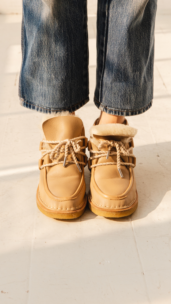 tan nude natural leather lace up shearling moccasin boot crepe sole premium side front in the foot