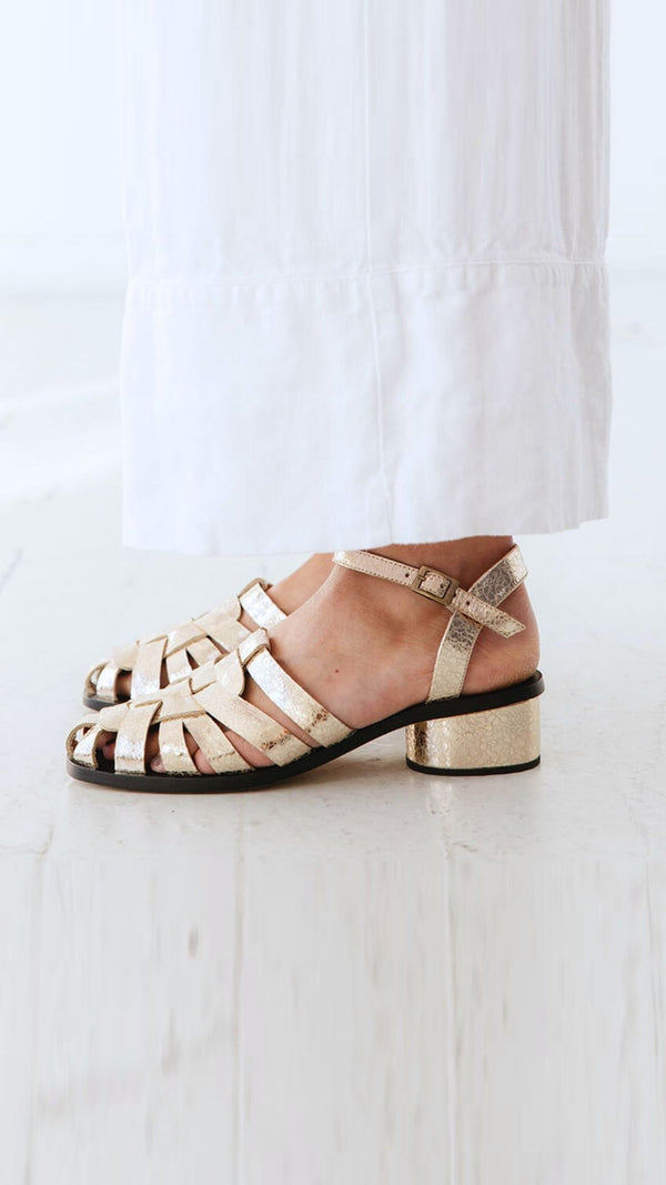 fisher low block heel buckle strap sandal comfortable metallic leather side view on foot