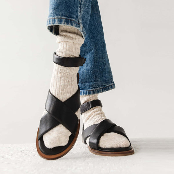 cloud sandal padded strap leather minimalist crossband sport sandal black artisan top view on foot