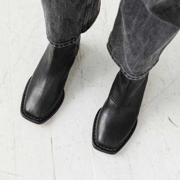 west boot taupe tumbled black leather block heel western square toe mid boot close up toe