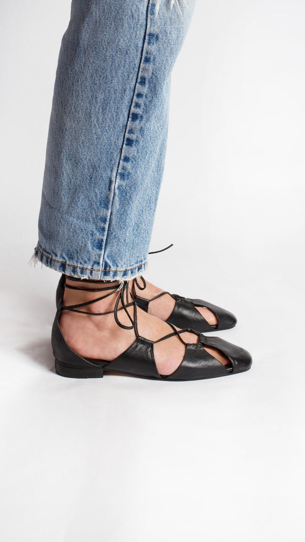 ghillie lace up black leather lace up cage flats sandals side view