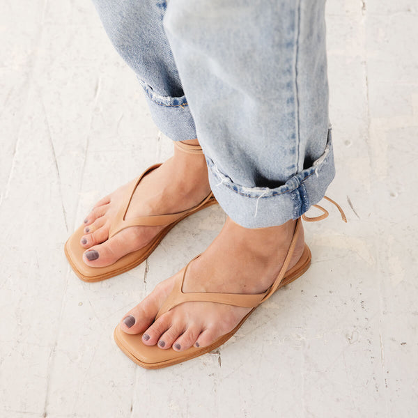 isla minimal leather thong flop flop sandal padded tan nude top down view
