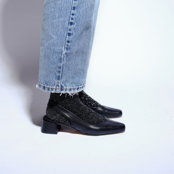 minimalist slingback block heeled pump in black italian leather side view sparkle socks