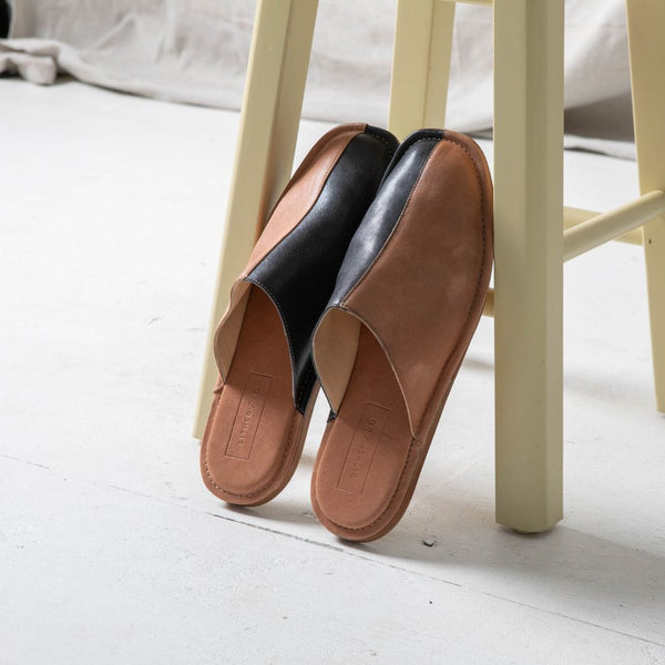 Our newest, comfiest wear-everywhere silhouette. Inspired by the classic menswear slipper, babouche, or uwabaki (Japanese house slipper), this versatile style is equally suited for a lazy day around the house, running errands, or an art show. Ethically Handmade in Portugal. Either.Or - Handmade with Care.