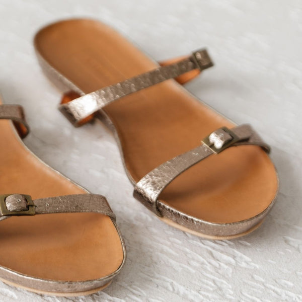 Metallic cork footbed sandal minimalist two buckle strap slide buckle detail