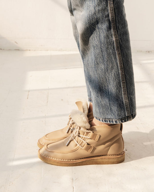 tan nude natural leather lace up shearling moccasin boot crepe sole premium side natural leather welt side on foot