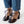 demi lace up heel in black leather round toe block heel on the foot