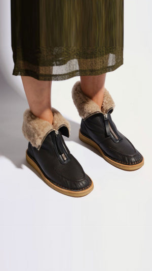 aurora chocolate leather natural shearling zip up crepe socle moccasin boot on the foot