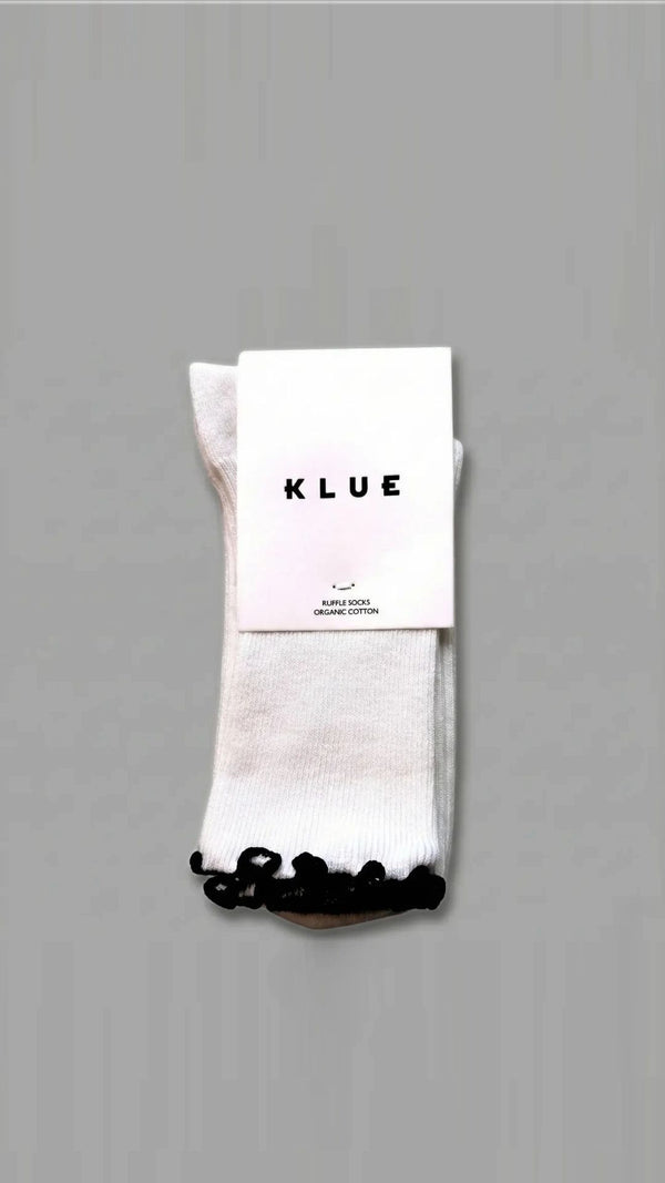 organic cotton ribbed sock with black ruffled lettuce edge by klue
