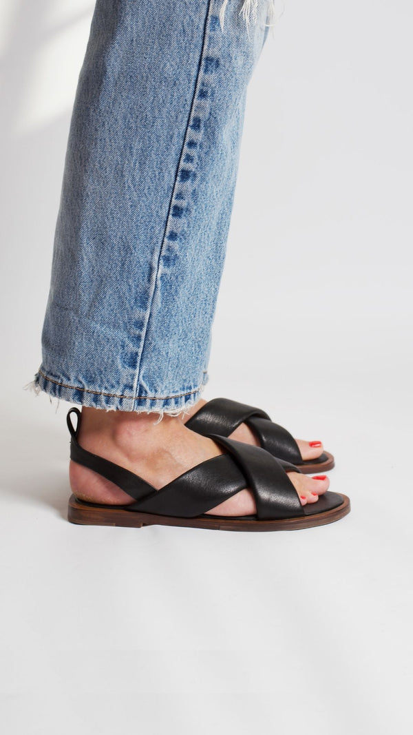 cloud sandal padded strap leather minimalist crossband sport sandal black   artisan on foot side view