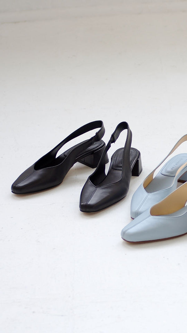 minimalist slingback block heeled pump in black italian leather baby blue