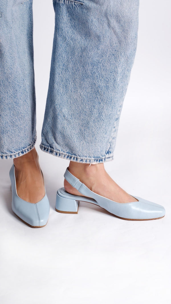 minimalist slingback block heeled pump in sky baby blue leather on the foot