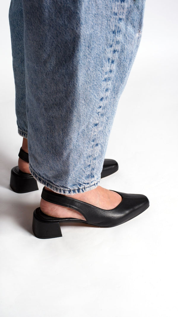 minimalist slingback block heeled pump in black italian leather side view