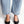 minimalist slingback block heeled pump in black italian leather on the foot front view