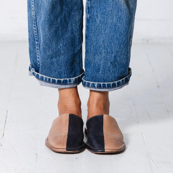 Our newest, comfiest wear-everywhere silhouette. Inspired by the classic menswear slipper, babouche, or uwabaki (Japanese house slipper), this versatile style is equally suited for a lazy day around the house, running errands, or an art show. Ethically Handmade in Portugal. Either.Or - Handmade with Care.